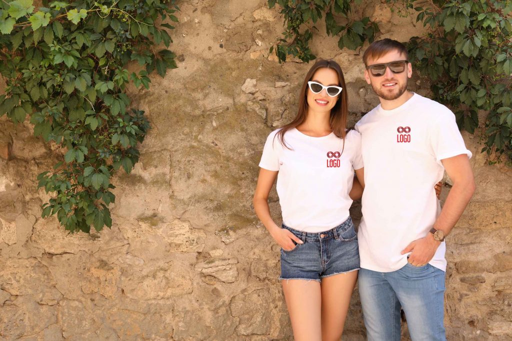 man and woman wearing t shirts and jeans